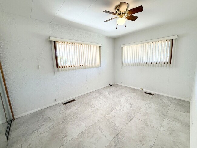 Building Photo - 10675 N Kilimanjaro Ave