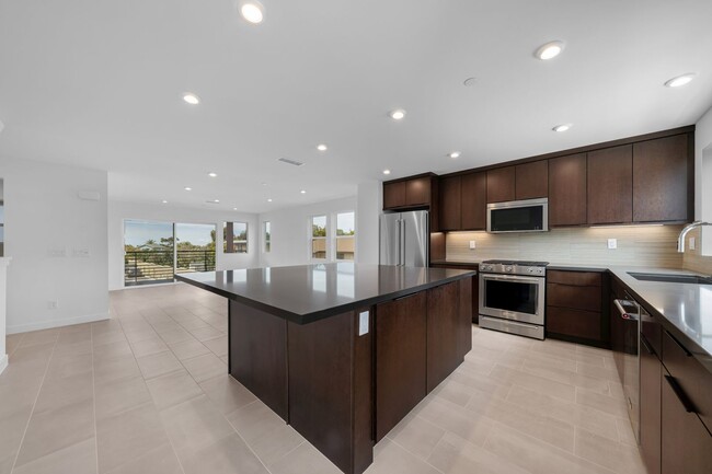 Building Photo - Available now! Brand New 4 Bedroom Townhom...