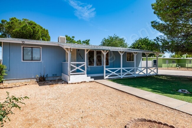 Building Photo - LARGE FENCED YARD WITH DETACHED GARAGE