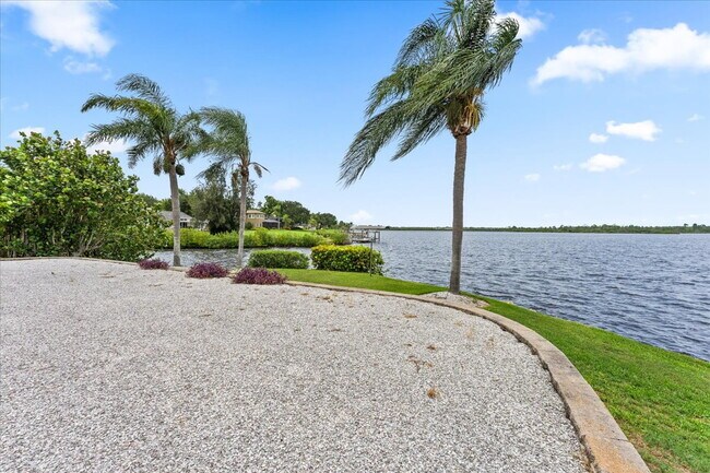 Building Photo - RENT THIS EXTRAORDINARY WATERFRONT HOME