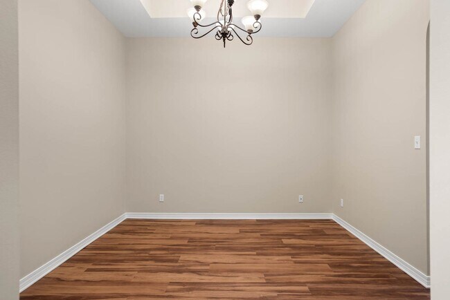 Building Photo - Stunning 4-Bedroom Home with Scenic Lake V...