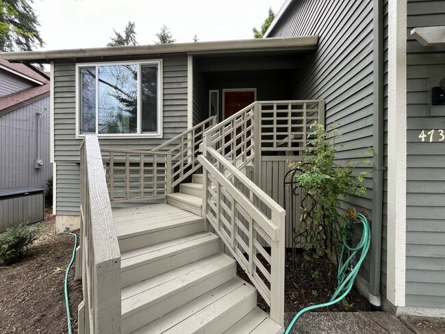Building Photo - Spacious 3-Bedroom Home with Custom Stone Fireplace, Attached 2-Car Garage & Expansive Backyard i...
