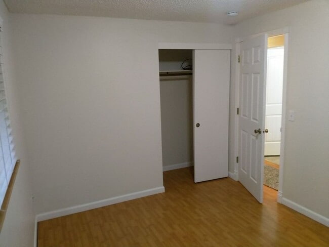 Building Photo - Charming updated 3 bed 1 bath ranch style home with double car garage and large fenced back yard.