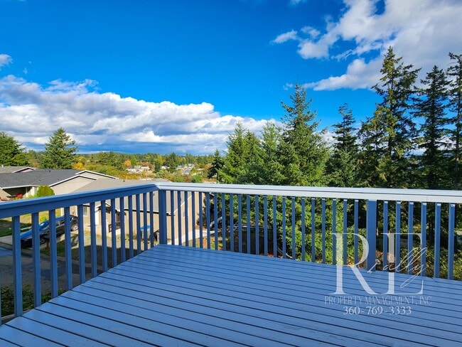 Building Photo - Rambler with 2-Car Garage, RV/Boat Parking...