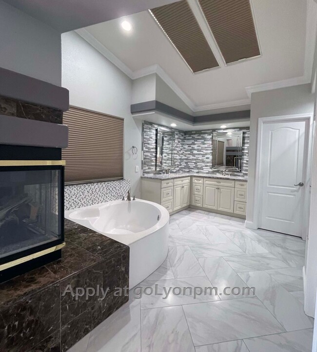 Building Photo - Home with Luxurious Upgrades and Modern Te...