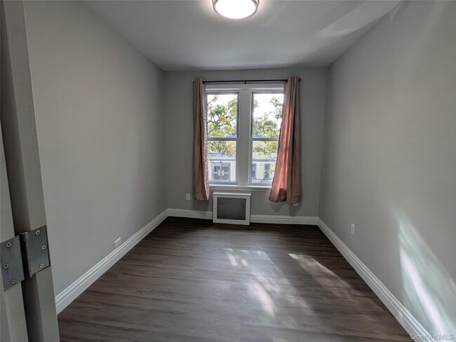 Building Photo - 205-17 Hollis Ave