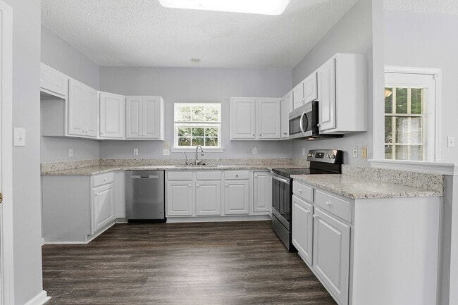 Building Photo - Updated 4BR Home in Timberlane with Fenced Yard and Stone Patio