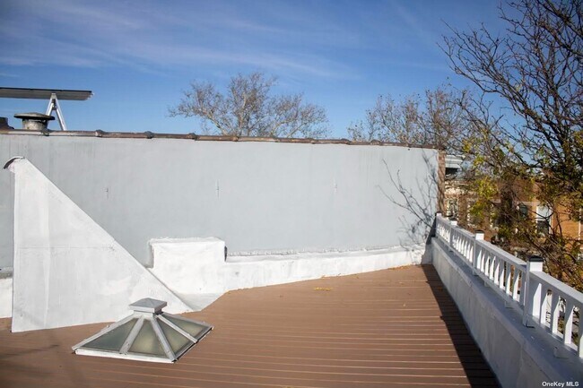 Building Photo - 61-29 Cooper Ave