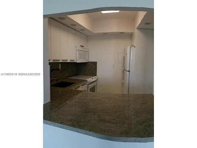 Building Photo - 5401 Collins Ave