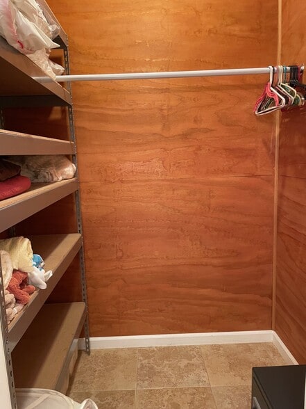 Large walk-in closet with open shelving. - 31312 Rd 280B