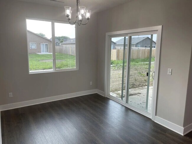 Building Photo - Single family slab home with three car garage. This home is 4 bedrooms, three bathrooms open floo...