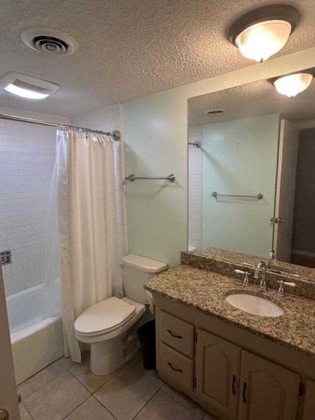 Building Photo - 6633 Poplar Woods Cir E