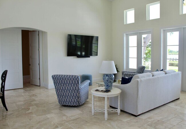 Building Photo - Fully Furnished 3 Bedroom, 3.5 Bath Home with Stunning Intracoastal views with dock