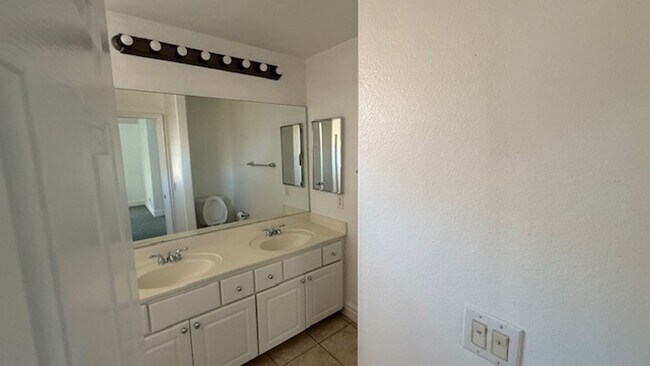 Building Photo - STUNNING 2 STORY HOME IN A GUARD GATED COM...
