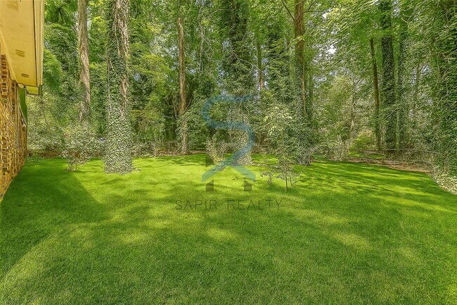 Building Photo - Move in before December 31st and choose your reward: a $250 Amazon Gift Card or a 55" Smart TV!