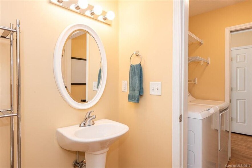 half bath down stairs - 606 Olde Covington Way