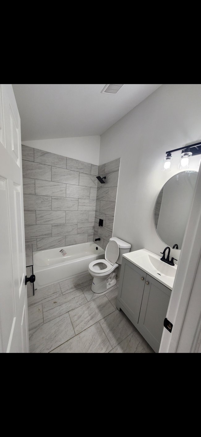 First floor full bathroom - 120 E 5th Ave