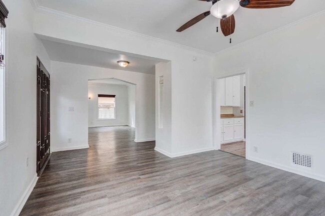Building Photo - Stylishly Renovated Retro Duplex in the He...