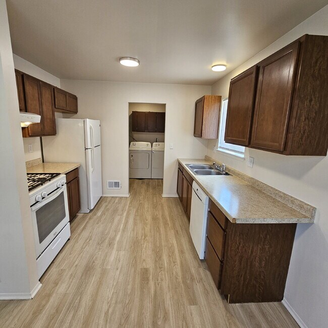 Building Photo - 3 Bedroom, 1 Bathroom Ranch with Updated Flooring, Paint, Carpet. 2 Car Garage. Kitchen with All ...