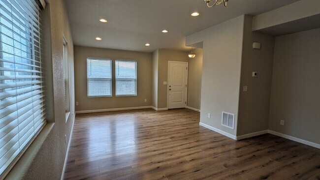 Building Photo - NEWER END UNIT TWO STORY TOWNHOME WITH A/C...