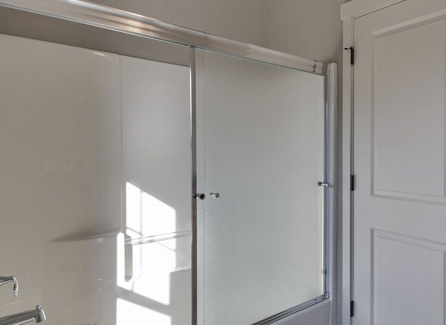 Building Photo - 2BR + 2.1BA Corner Townhome-Style Condo — Dual Primary Suites, Attached Garage & Most Utilities I...
