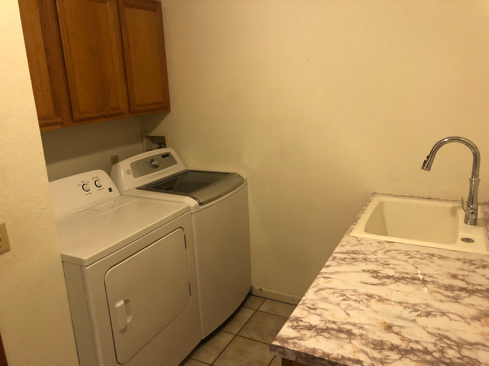Spacious main floor laundry room - 6223 Cross Bend Ct