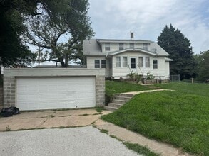 Building Photo - Spacious 4-Bedroom Rental with 2-Car Garage and Optional Shop