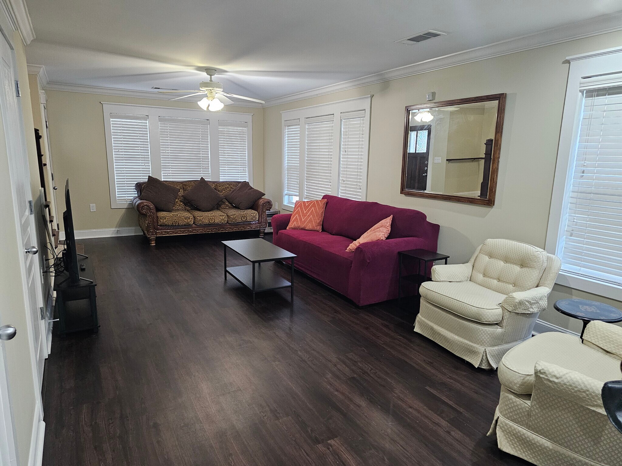 Furnished Living Room with a TV - 1725 Harvey Mitchell Pkwy S
