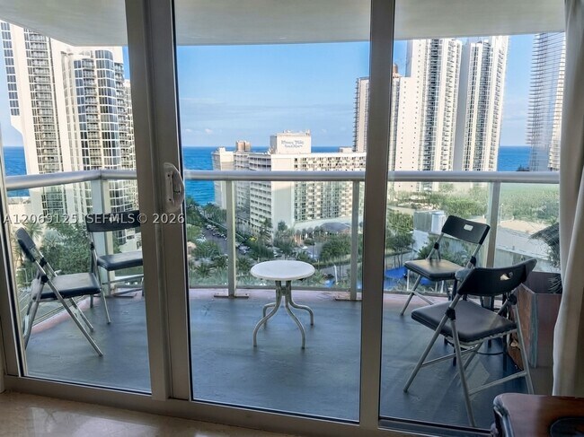 Building Photo - 19370 Collins Ave