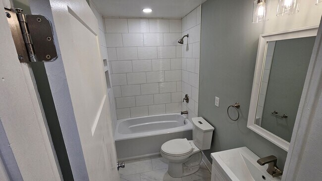 Building Photo - Stunning Renovation Ready for Your Finishing Touches!