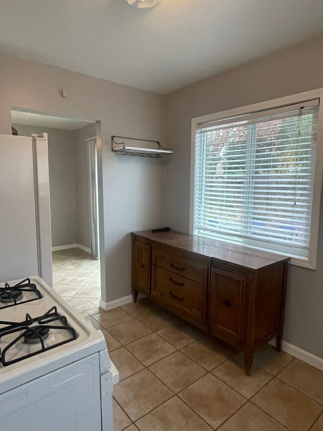 Building Photo - Bright, Updated Home with Garage, Laundry, and Private Yard