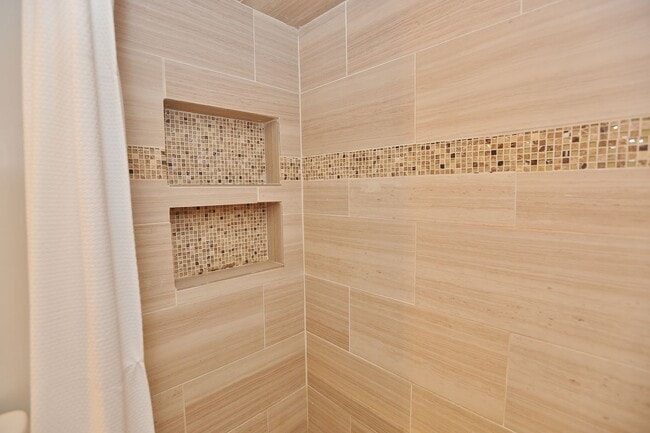 Building Photo - MUST SEE! Charming 3-Bedroom Townhome in Thoroughgood! 1-Car Attached Garage!