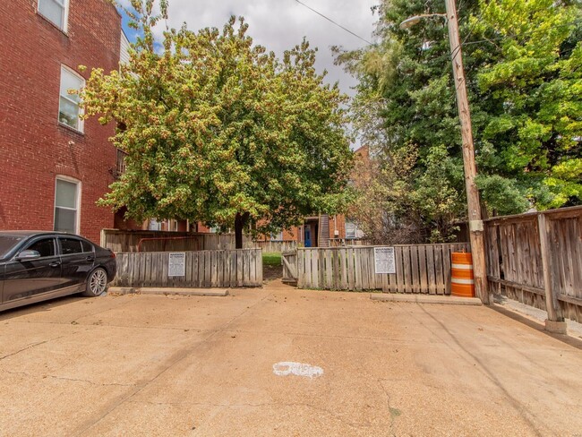 Parking pad for four cars - 906 Russell Blvd