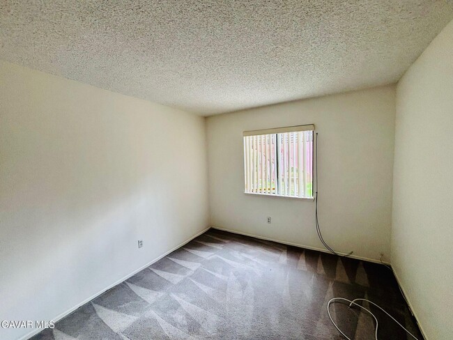 Building Photo - 3220 E Ave S2