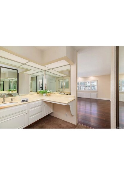 Master Bathroom sink looking towards Master Suite. - 5705 Friars Rd
