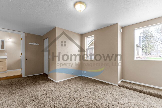 Building Photo - 1 Bedroom Cottage with Off-Street Parking Available in Midtown Coeur d'Alene!