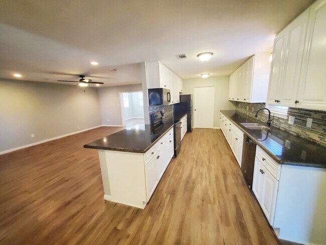 So much storage in this stunning galley kitchen. - 37438 Meadowview Dr
