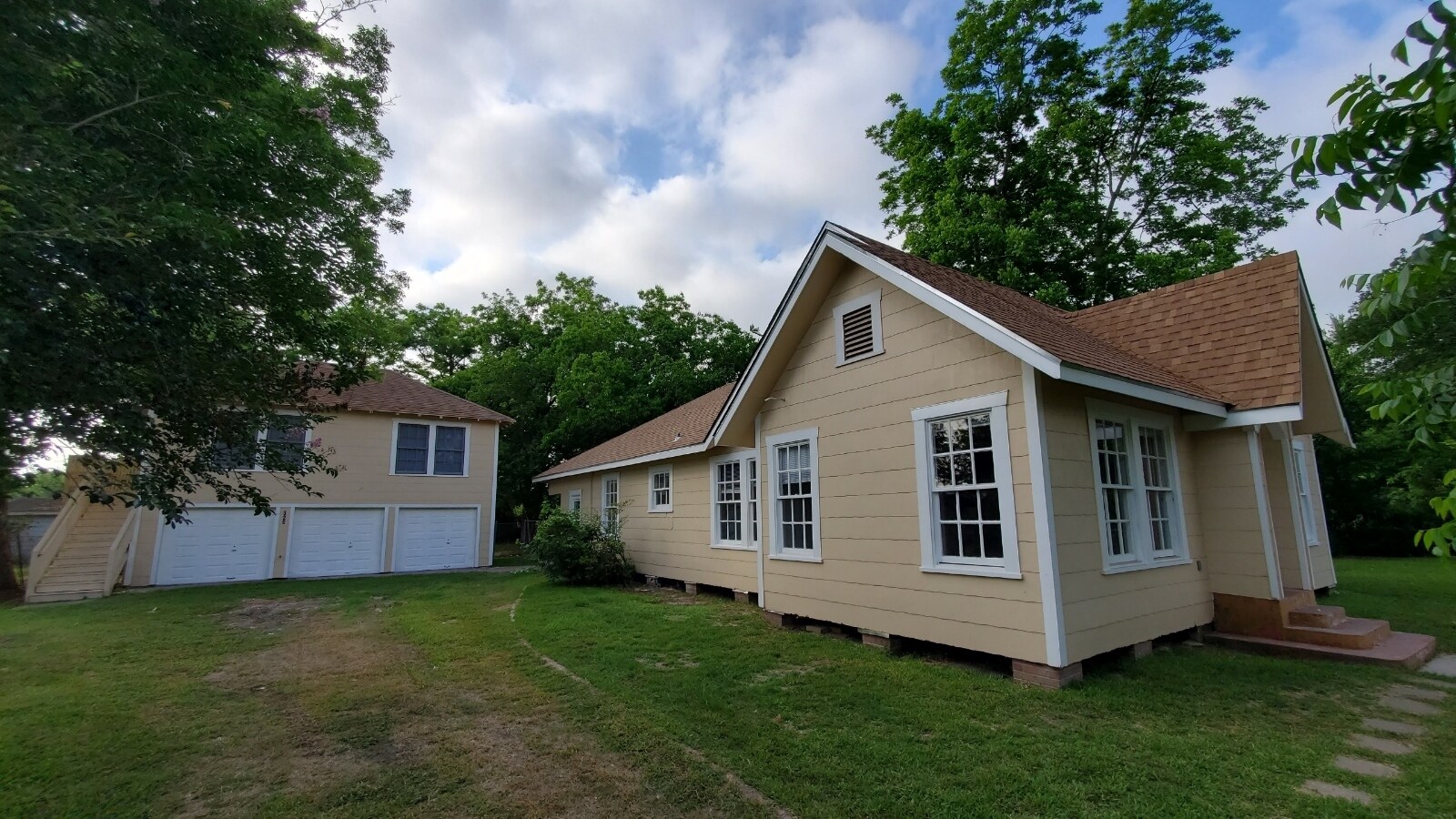 The home next door is an occupied 4 bedroom 2 bath home - 320 S Ashbel St