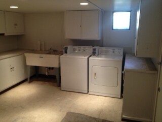 shared laundry space with coin-op washer and dryer - 201 W Lawrence St
