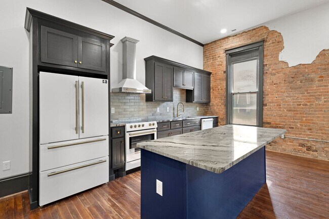 Building Photo - Historic Charm Meets Modern Luxury