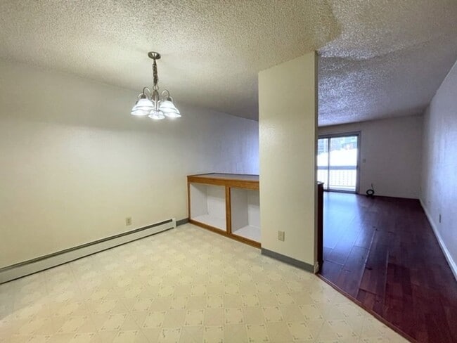Building Photo - East Anchorage Condo with Laminate Floorin...