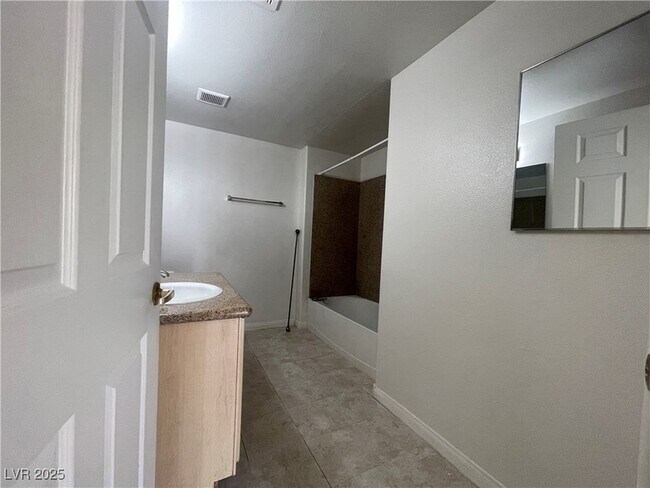 Building Photo - 8000 W Badura Ave