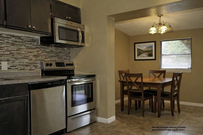 Building Photo - Beautiful 3bd 2bth Home with patio and large back yard available now! Great Location! Landscaping...