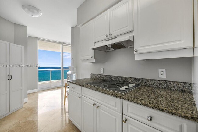 Building Photo - 4775 Collins Ave