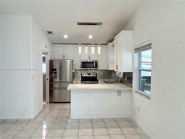 Building Photo - 7071 W 33rd Ln