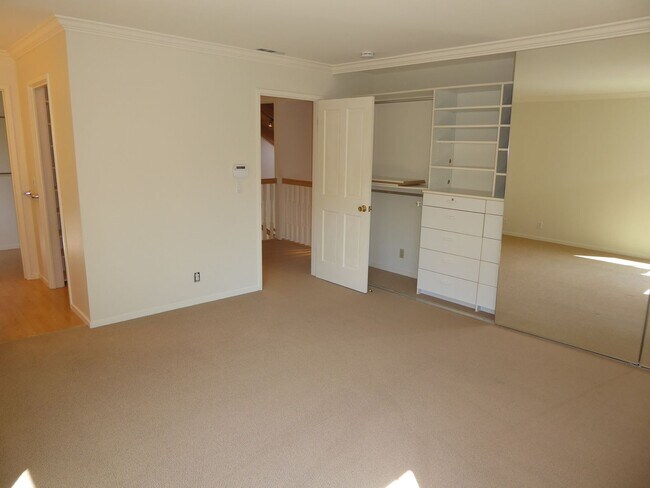 Building Photo - SPACIOUS FOUR BEDROOM / THREE AND HALF BAT...