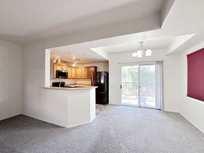 Building Photo - 1 BEDROOM DOWNSTAIRS CONDO IN GATED COMMUNITY 1 CAR GARAGE