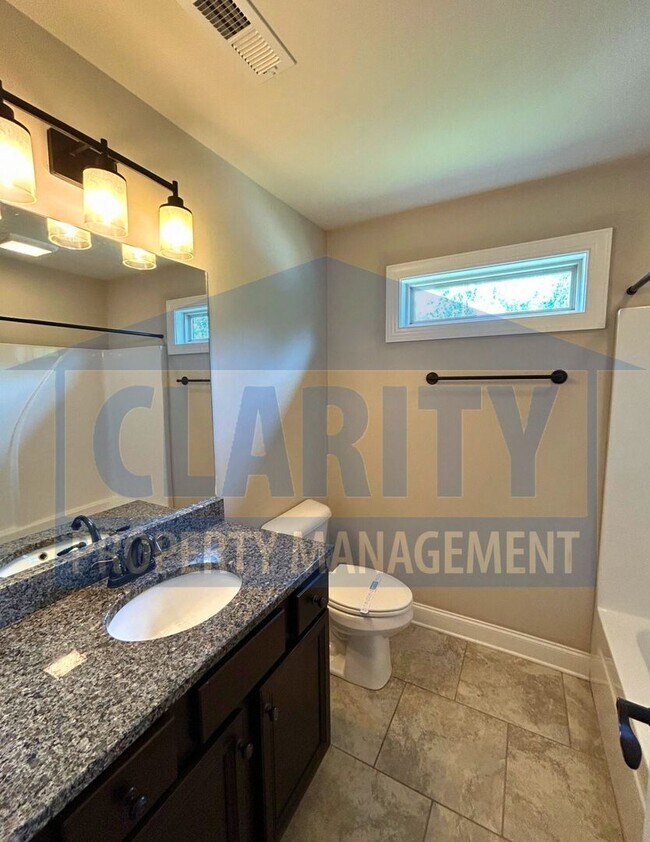 Building Photo - Modern, Upscale Townhouse w/ attached Garage!
