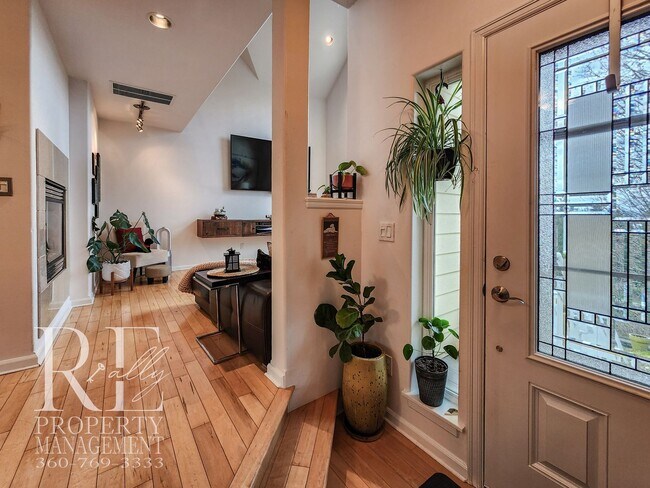 Building Photo - Light-Filled View Home with Vaulted Ceilings & Warm Wood Finishes