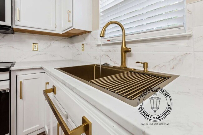 Building Photo - "Charming 4-Bedroom Retreat with Fireplace & Hardwood Floors on Michelle Drive!"